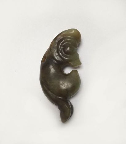 Small dragon coiled in green nephrite with...
