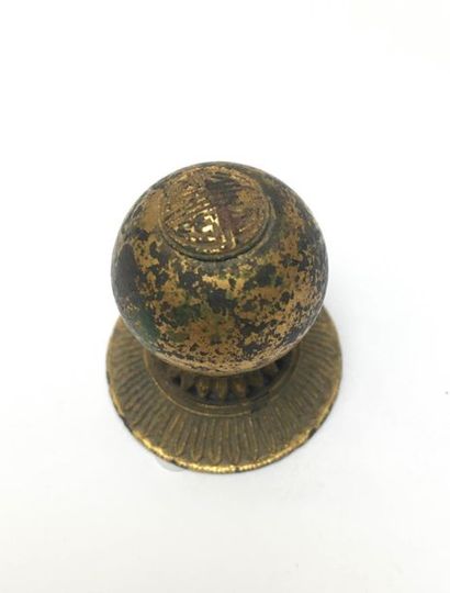 Top button of a mandarin headdress in gilt...