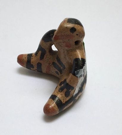 Painted terracotta figurine representing...