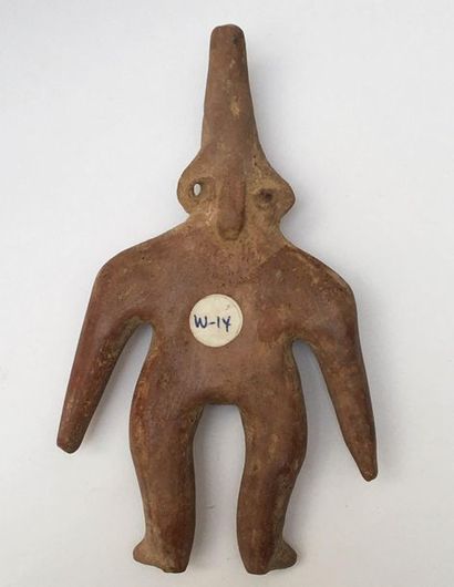 Very stylized fertility goddess with a pointed...