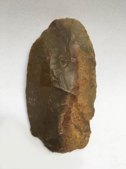 Flint axe carved in the Upper Paleolithic...