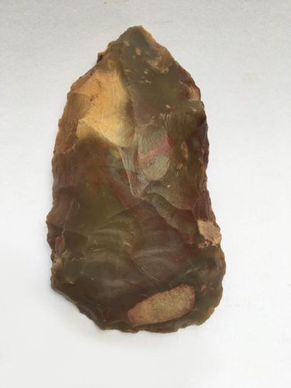 Flint axe carved in the Upper Paleolithic...