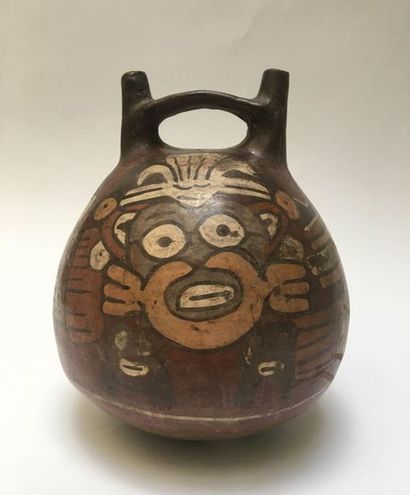 Ball vase with two spouts joined by a handle,...