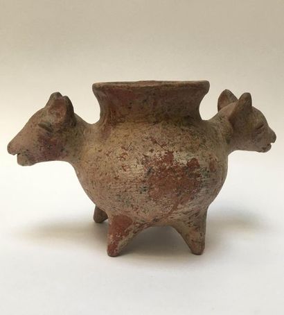 Quadripod vase decorated on both sides with...