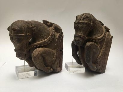 Carved wooden chariot elements representing...