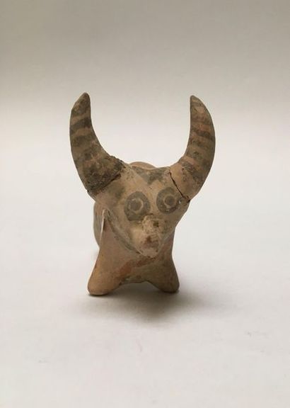 Striped terracotta zebu painted brown.

Nindowari...