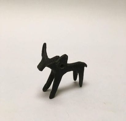 Bronze zebu with green patina pierced with...