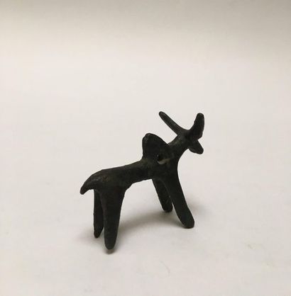 Bronze zebu with green patina pierced with...