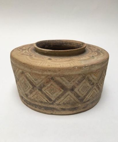 Beige terracotta pot with a quadrangular...