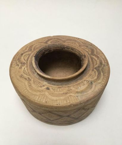 Beige terracotta pot with a quadrangular...