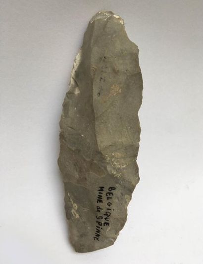 Paleolithic grey flint axe. (700,000 years)...