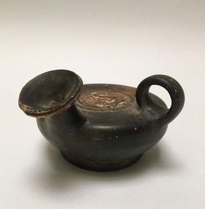 Guttus with black varnish, whose centre of...