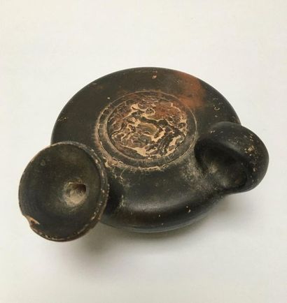 Guttus with black varnish, whose centre of...