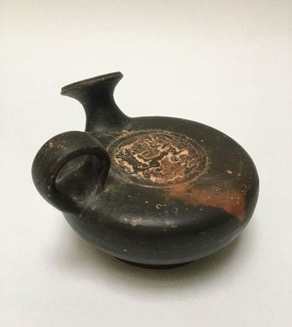 Guttus with black varnish, whose centre of...