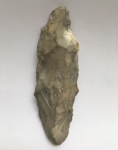 Paleolithic grey flint axe. (700,000 years)...
