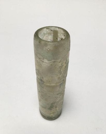 Iridescent glass vase of tubular shape.

Islamic...