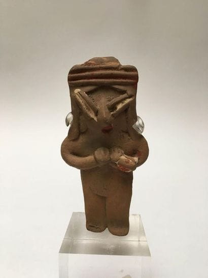 Female standing terracotta figurine enhanced...