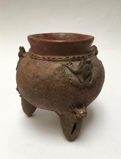 Brown terracotta bell vase. It bears on the...