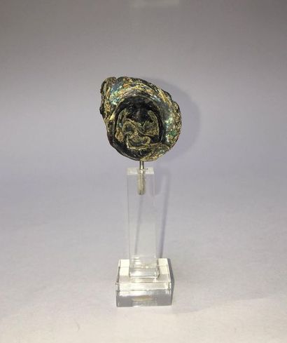 Theater mask: fragment of the base of a glass...