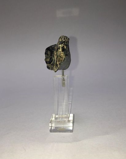 Theater mask: fragment of the base of a glass...