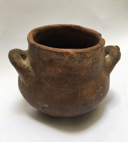 Pot with handles in red lightly fired clay.

Neolithic...