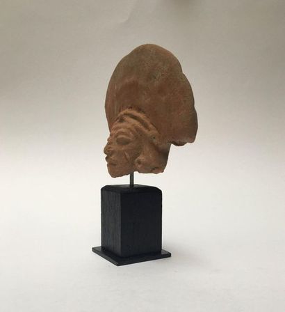 Dignitary's head in beige terracotta with...