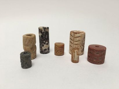 Set of seven engraved cylinder seals decorated...