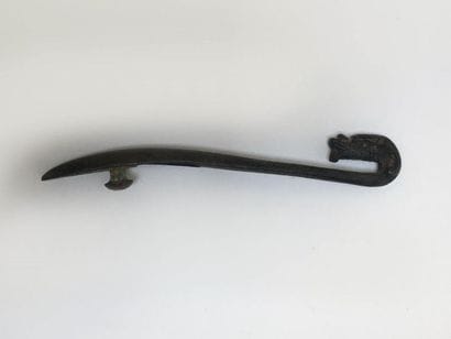 Classic bronze fibula with green patina....