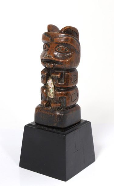 Zoomorphic fetish wooden totem pole with...
