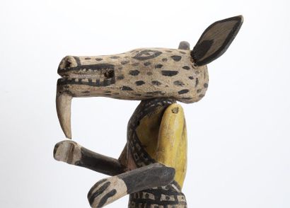 Decorative doll with animal head made of...