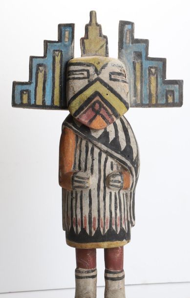 Decorative doll in polychrome wood.

Kachina,...