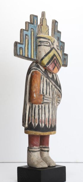 Decorative doll in polychrome wood.

Kachina,...
