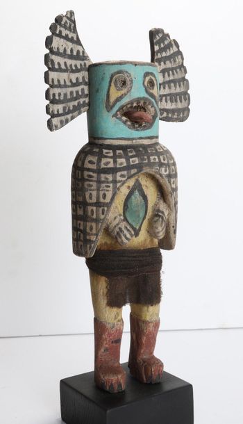 Decorative doll in polychrome wood.

Kachina,...