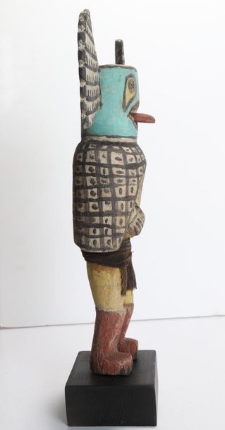 Decorative doll in polychrome wood.

Kachina,...