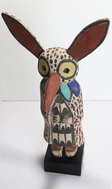 Decorative doll in polychrome wood.

Kachina,...