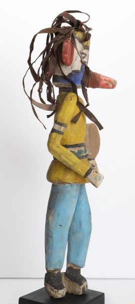 Decorative doll in polychrome wood.

Kachina,...