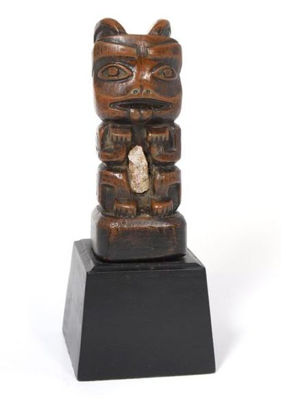 Zoomorphic fetish wooden totem pole with...
