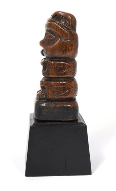 Zoomorphic fetish wooden totem pole with...