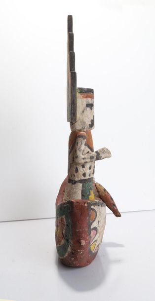 Decorative doll in polychrome wood.

Kachina,...