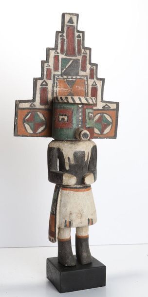 Decorative doll in polychrome wood.

Kachina,...