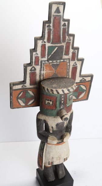 Decorative doll in polychrome wood.

Kachina,...