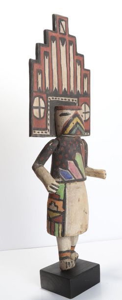 Decorative doll in polychrome wood.

Kachina,...