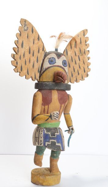 Decorative doll in polychrome wood.

Kachina,...