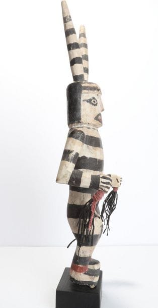 Decorative doll in polychrome wood.

Kachina,...