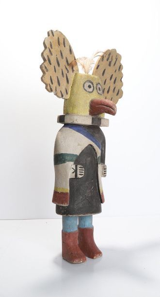 Decorative doll in polychrome wood.

Kachina,...