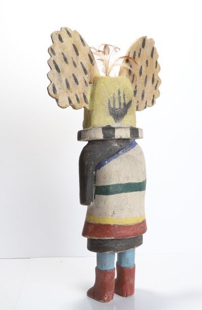 Decorative doll in polychrome wood.

Kachina,...