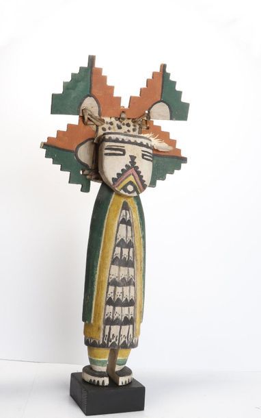 Decorative doll in polychrome wood.

Kachina,...