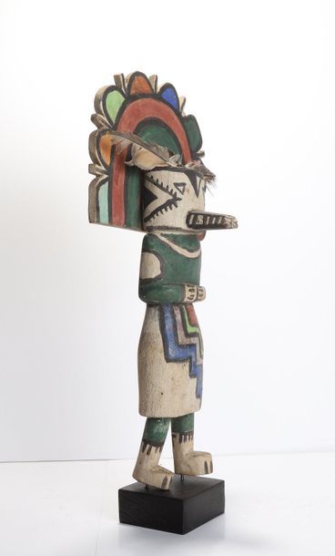 Decorative doll in polychrome wood.

Kachina,...