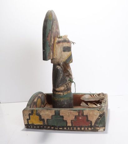 Decorative doll in polychrome wood.

Kachina,...