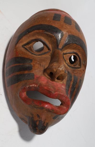 Anthropomorphic decorative mask with an open...